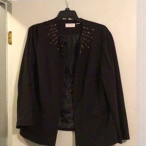 Ladies black blazer with accents.